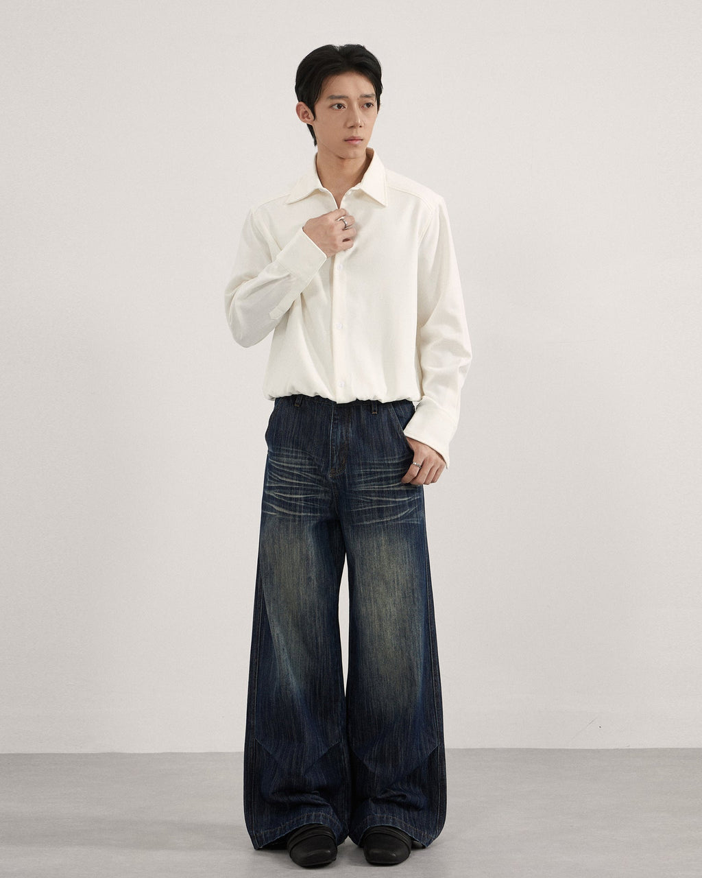 Jeans met plooi en vervaagde wassing heren