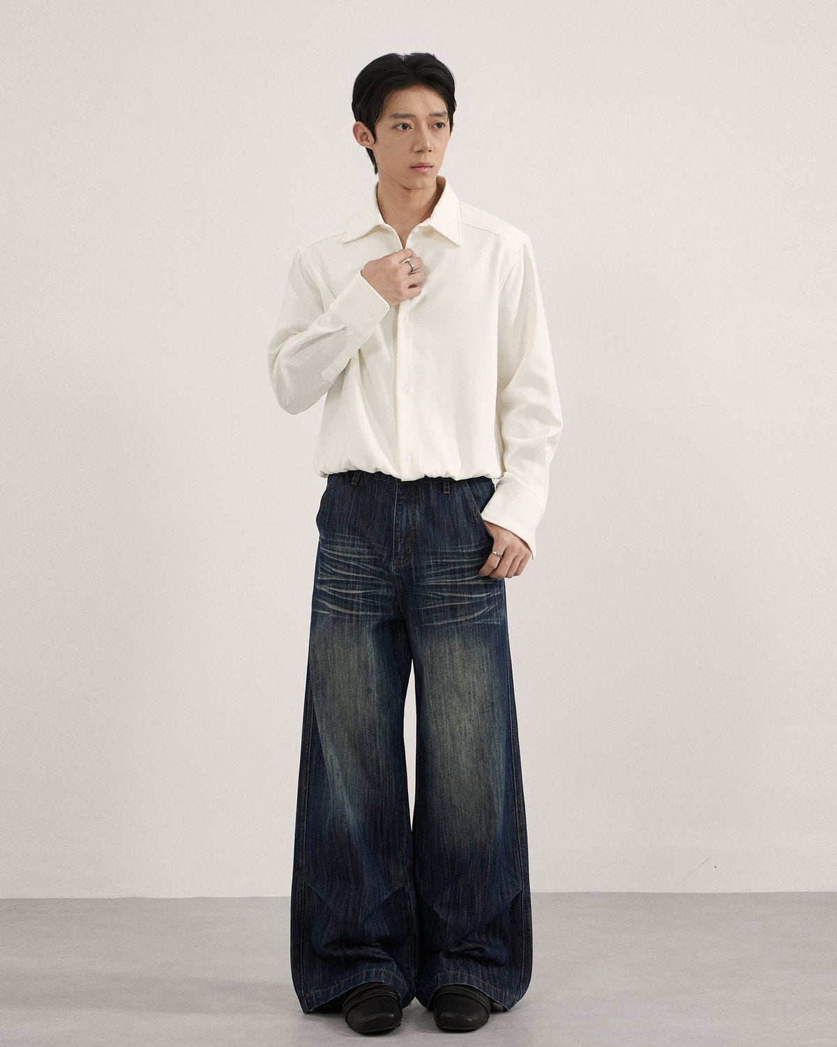 Jeans met plooi en vervaagde wassing heren