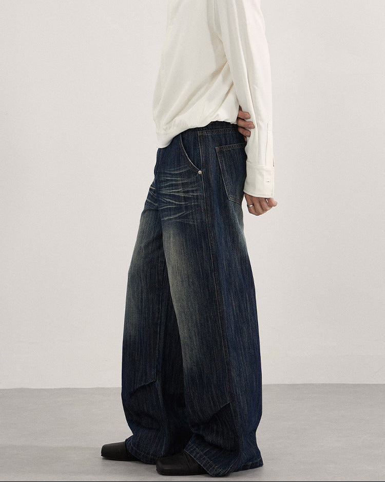 Jeans met plooi en vervaagde wassing heren