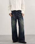 Jeans met plooi en vervaagde wassing heren
