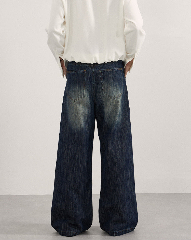 Jeans met plooi en vervaagde wassing heren